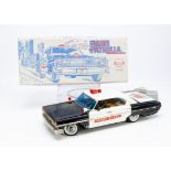 A Scarce Rico Battery-Operated Man From U N C L E Police Car, large tinplate remote controlled