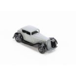 A Dinky Toys 36c Humber Vogue, early post-war issue, grey body, black moulded chassis with slots,