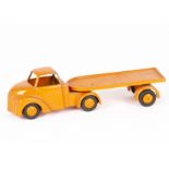 A Gamda (Israel) Diecast Articulated Flatbed, orange cab, flatbed and hubs, 'Gamda Made In Israel'