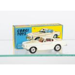 A Corgi Toys 258 The Saint's Volvo P 1800, white body, black 'Saint' transfer, red interior, spun