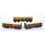 Three Bassett-Lowke O Gauge lithographed LNWR Coaches, all in LNWR 'plum and spilt milk', two 1921-