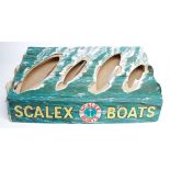 A rare Tri-ang Scalex Boats Shop display for four vessels, constructed in card with printed sea with