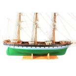 A 20th Century painted wood model of the Clipper 'Southern Cross', the weighted hull of carvel-built