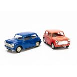 A Pair Of Tri-ang/Penguin 1/20 Pull Back N' Go Super Minis, one with dark blue plastic body, one