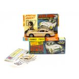 A Corgi Toys 261 James Bond's Aston Martin D B 5, gold body, red interior, wire wheels, Bandit