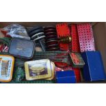 Collection of red and green Meccano and accessories, including red and green plates and braces,