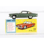 A Corgi Toys 241 Ghia L 6 4, metallic green body, off-white interior, spun hubs, E, a few minor