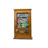 A Wondermatics Allwin Penny Slot Machine 'Win And Place', c 1954, in oak case, approx 780 x 500mm,