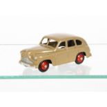 A Dinky Toys 40e Standard Vanguard, fawn body, open rear wheel arches, red hubs, small baseplate