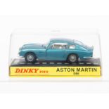 A Dinky Toys 153 Aston Martin DB6, metallic turquoise body, white interior, cast spoked wheels, in