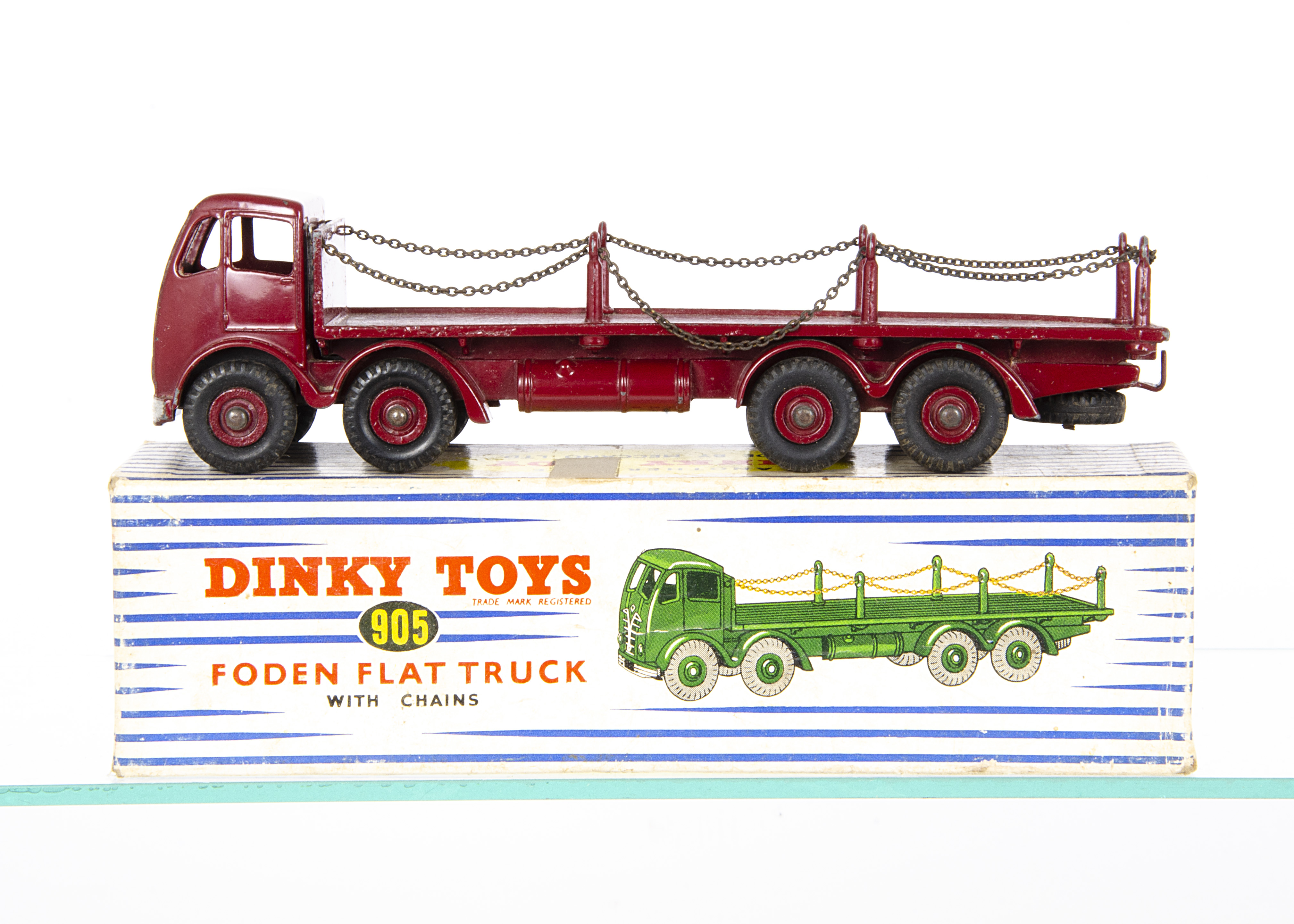 A Dinky Toys 905 Foden Flat Truck With Chains, 2nd type maroon cab, chassis, flatbed and grooved