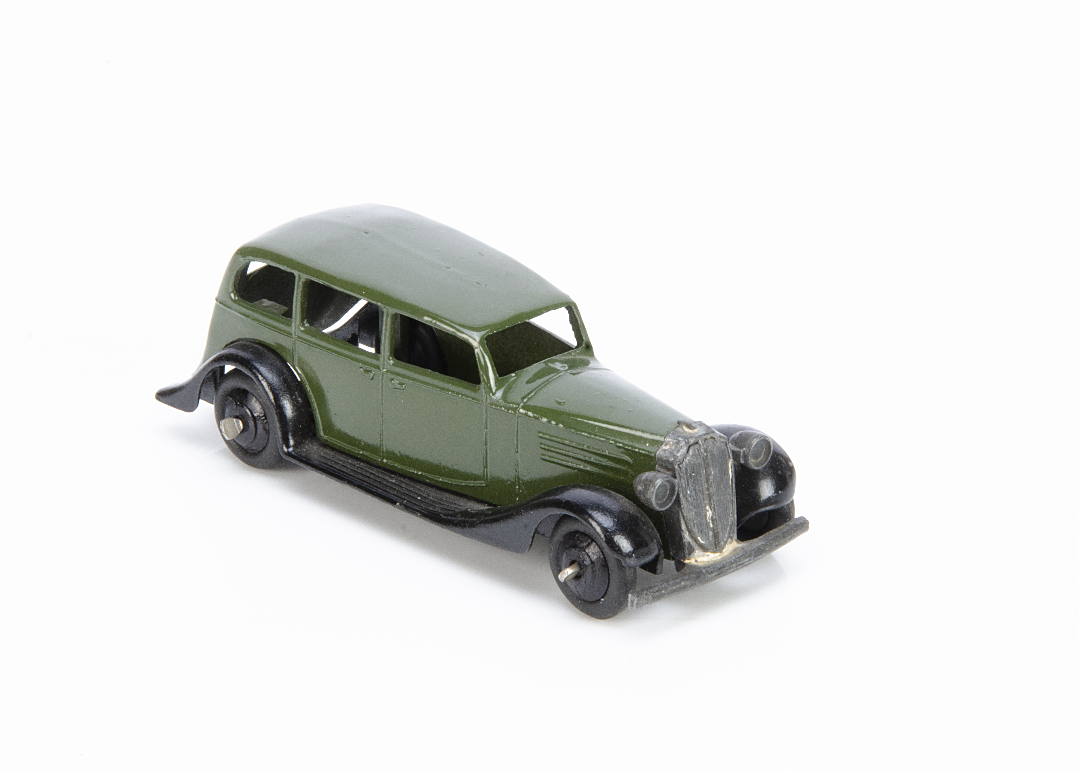 A Dinky Toys 30d Vauxhall, dark olive green body, black plain chassis and ridged hubs, E