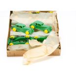 A Palitoy Trade Box Of Twelve Plastic Jaguars, freewheeling green plastic models with yellow