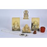 A pair of 20th Century Chinese alabaster or hardstone bookends taking the form of Buddha, height