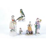 An 18th or early 19th Century English porcelain figure of a winged female figure with a songbird