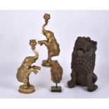 A terracotta mythical lion dog statue, height 35cm, together with three other Asian interior