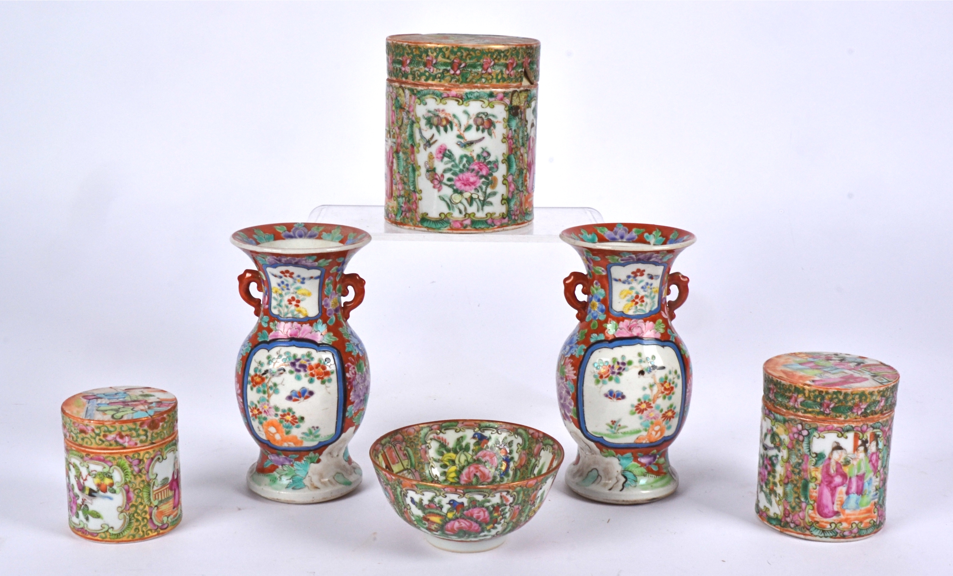 Three 19th Century Chinese Canton rose medallion cylindrical pots, with alternating cartouches of