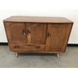 An Ercol sideboard, 114cm wide, 82cm high and 49cm deep