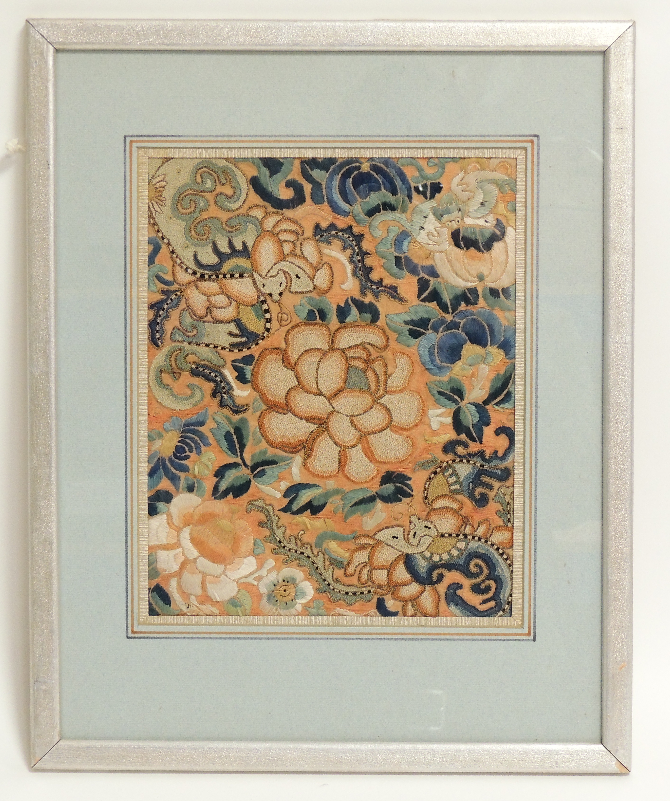 A framed sample of 19th Century Chinese Peking knot work probably from a robe, with central flower