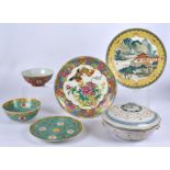 A 20th Century Chinese rice porcelain tureen, the lid with bats, the base with precious objects,