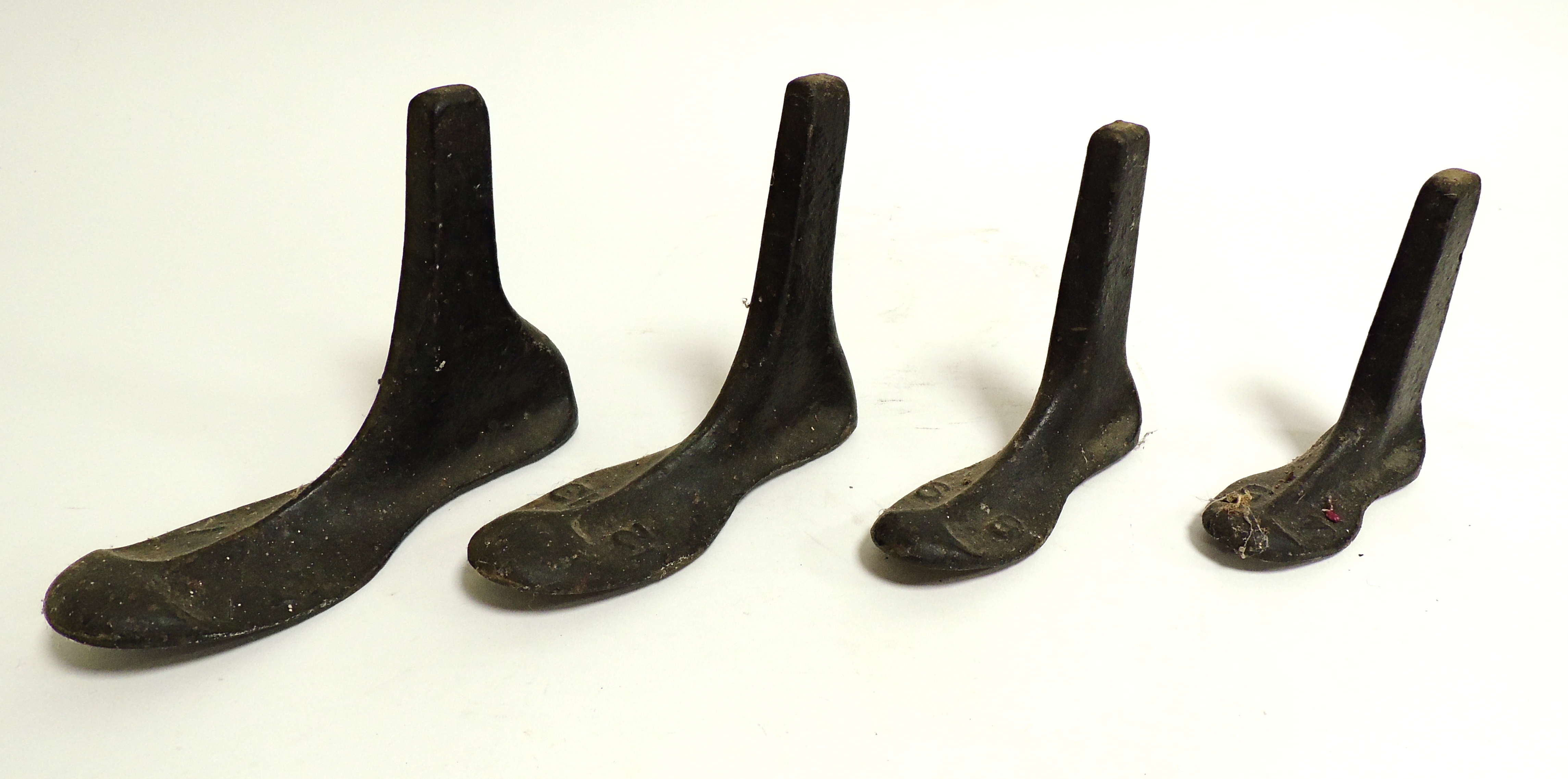 Four cast iron shoe lasts, in graduated sizes, possibly from a cobblers, the largest 23cm (4) - Image 3 of 4