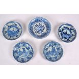 Five Chinese export dishes with blue and white decoration, four floriform dishes with concentric