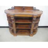 A Victorian rosewood console bookcase, bow front with parquetry Greek key design to frieze,