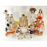 A collection of Victorian Staffordshire figures, to include a little red riding hood and the wolf