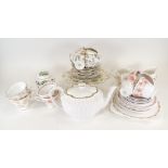 An eight piece Derby porcelain part tea set, of fluted form, decorated in gilt, the base with