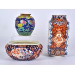 A 20th Century Imari decorated vase with alternating panels of baskets of flowers and formal