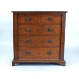 An oak collectors chest raised on ogee feet, with two short over three long drawers, 48cm x 47cm