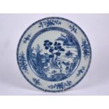 A late 18th or early 19th Century Chinoiserie underglaze blue and white porcelain plate, possibly