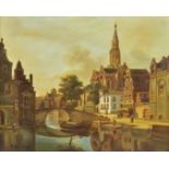 A early 20th Century Dutch oil on board, buildings alongside a canal, signed (lower left) 'R. Van