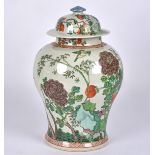 A Chinese 20th Century baluster vase and cover with overglaze wucai enamel of birds perching on