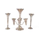 A c1900 London hallmarked silver epergne, dated 1903, with four small fluted cups and one large