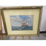 An early 20th Century watercolour of a ship, signed R.M. Tirbuteau, framed and glazed, with losses
