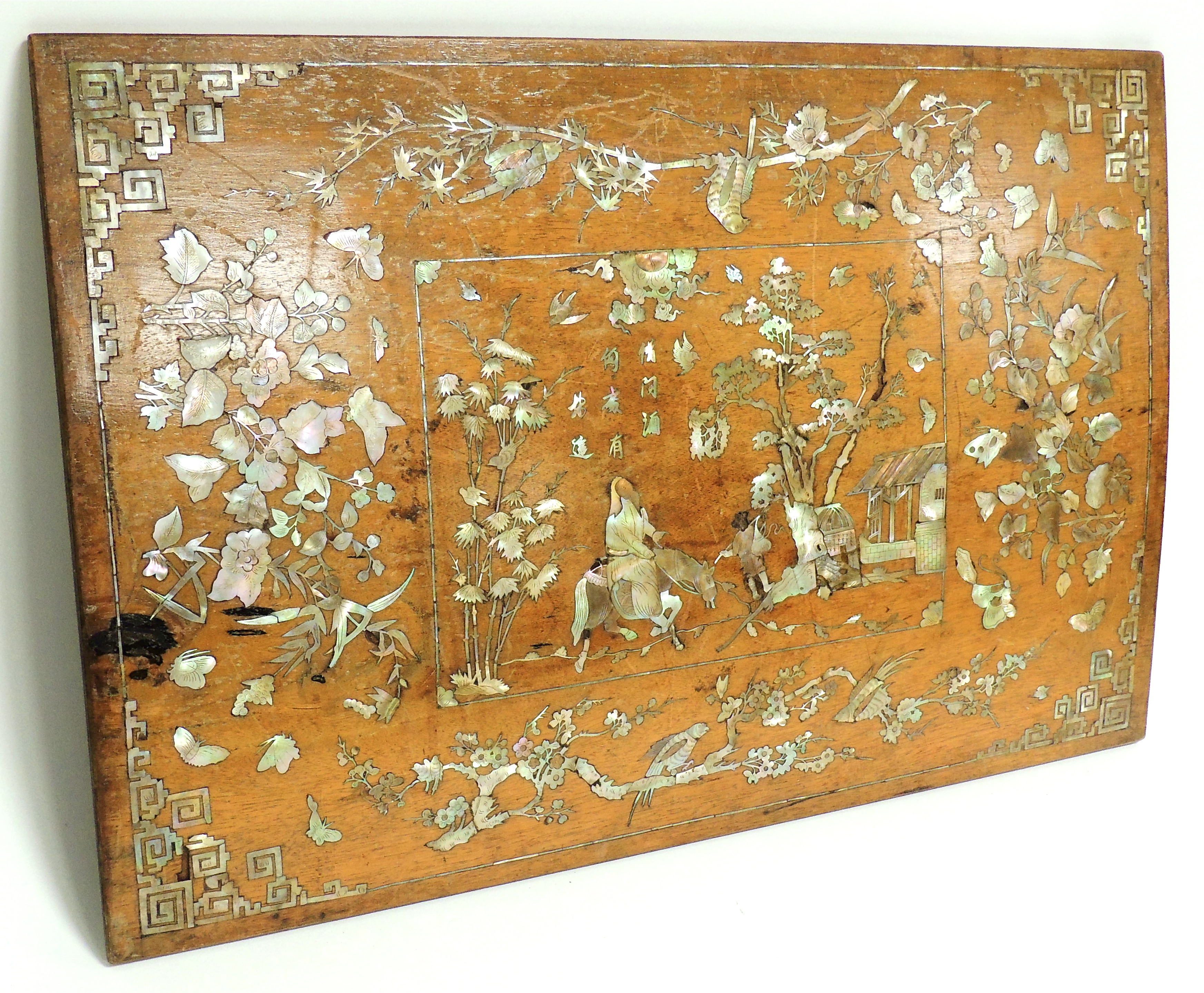 A Chinese wooden panel with inset mother of pearl, depicting a figure riding a horse, quite possibly - Image 2 of 2