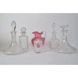 Four glass decanters, together with a cranberry glass jug and lidded pot (6)