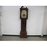 A Victorian mahogany long case clock, brass dial with silver chapter ring and having seconds