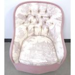 A contemporary Boudoir chair, button back with drop in fitted cushion, upholstered in a lilac and