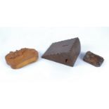 A group of Mouseman style treen carvings, one a money box in the form of a wedge of cheese with a