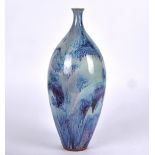 A Chinese ovoid vase with molten hares fur type glaze, Jun ware hues of purple, lavender and blue,