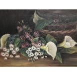 A early 20th Century oil on canvas, still life with flowers beside a basket, unsigned, framed,