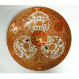 A 19th Century or early 20th Century Imari charger, probably Japanese, the raised central roundel