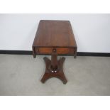 A William IV mahogany work table, single drawer with dummy to other side, drop leaves, on tapered