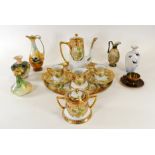 A Royal Worcester squat vase with relief moulding and floral decoration, the base with green Royal