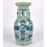 A Chinese 20th Century baluster vase with underglaze blue and white decoration, the body with a