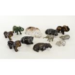 A small collection of hardstone animals, to include tigers eye elephant and lions, together with