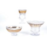 A trio of cut glass centrepieces with hobnail diamond design with gilt banding and foliate design,
