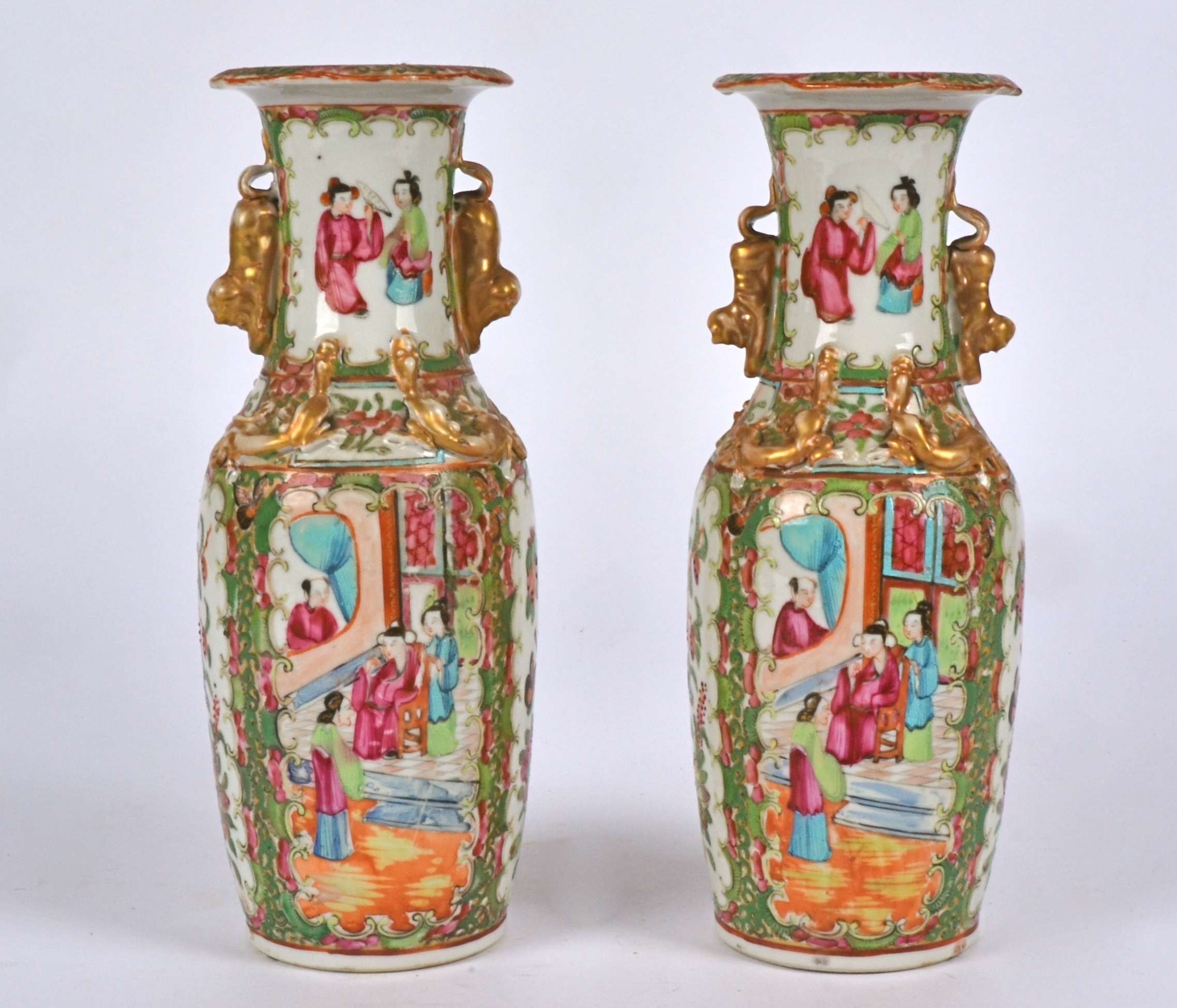 A pair of 19th Century Chinese Canton rose medallion baluster vases, decorated in overglaze
